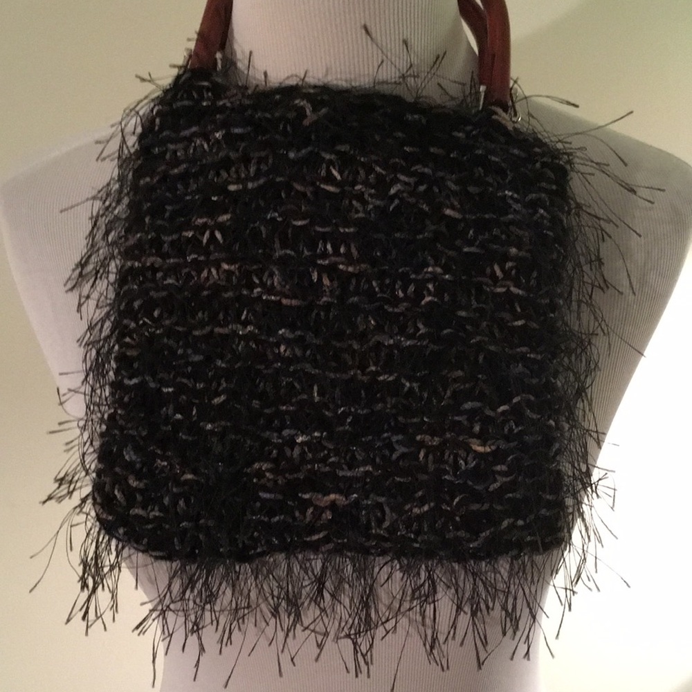 Women’s crocheted furry handbag